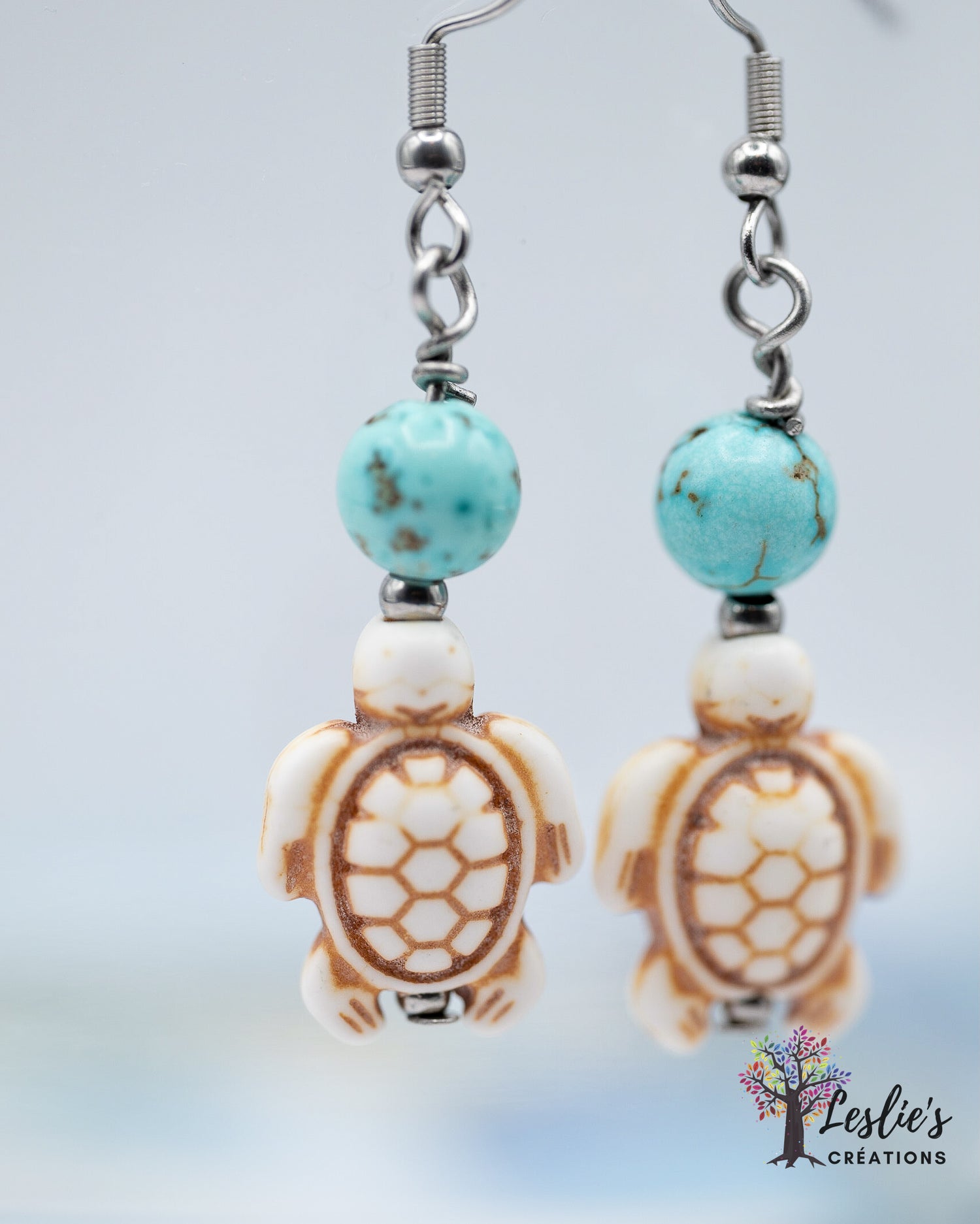 Howlite turtles and turquoise bead Earrings